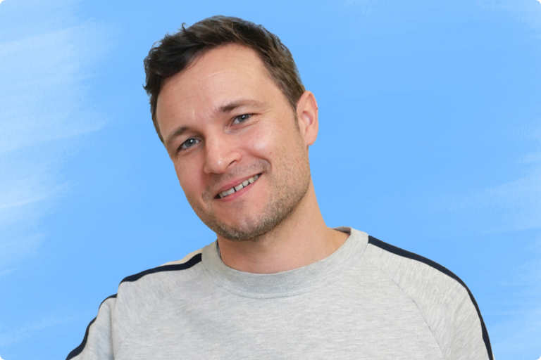 Headshot of Adrian Bartha, raisin's CEO